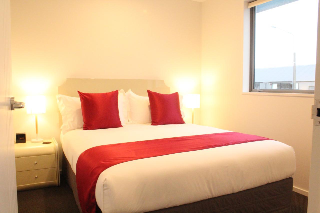 Bealey Plaza Motel Christchurch Exterior foto A bed with a bed runner